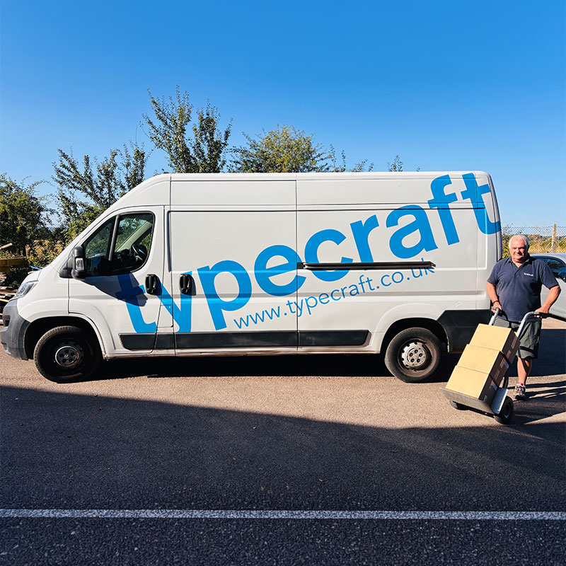 Typecraft branded van being loaded with boxed print outside our Cheltenham premises