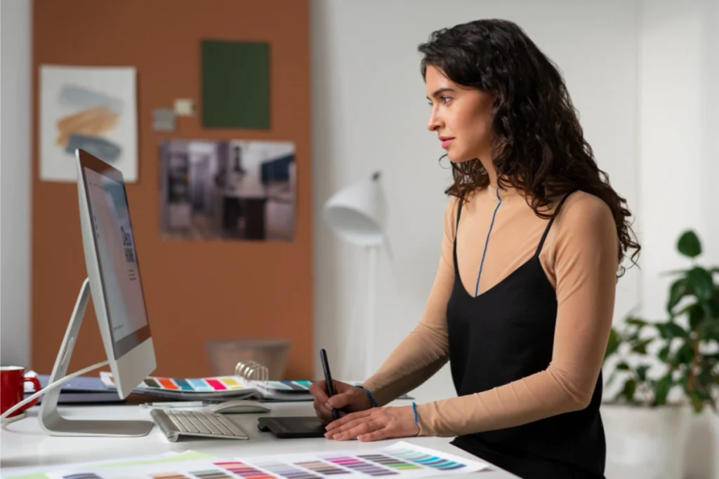 Print designer preparing artwork for a printed project