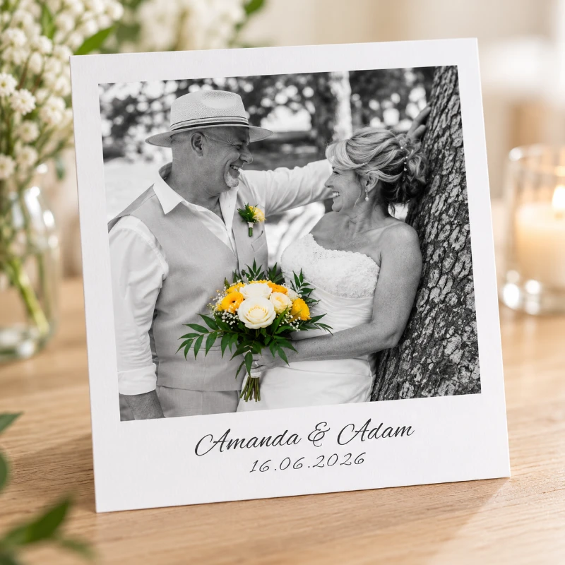 Printed wedding photo card with the couple's names and date